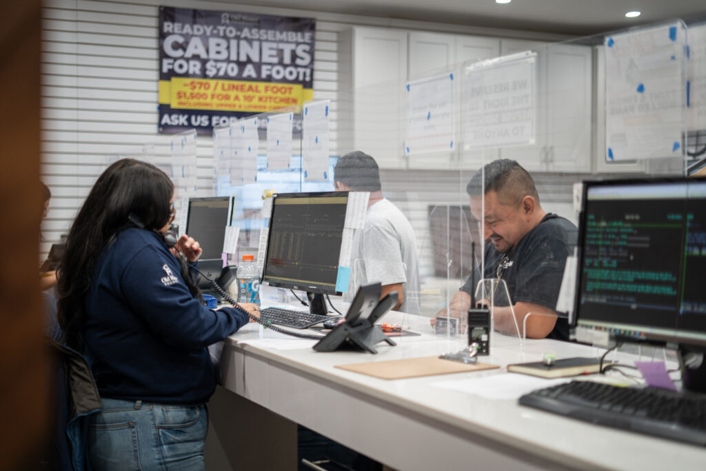 Customer receives help at Old Master Products headquarters in Van Nuys, CA