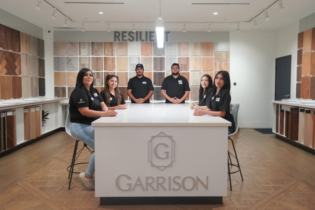 Team of Garrison flooring sales representatives in Van Nuys showroom