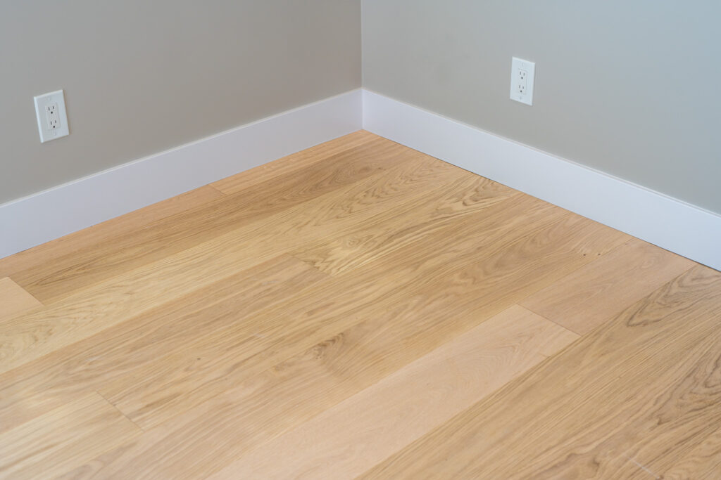 Hardwood floors by Garrison with Old Master Products Mouldings