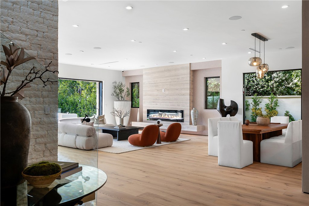 Light-colored luxury hardwood flooring in a modern California home, enhancing the open, sunlit space with its elegant grain and smooth finish.